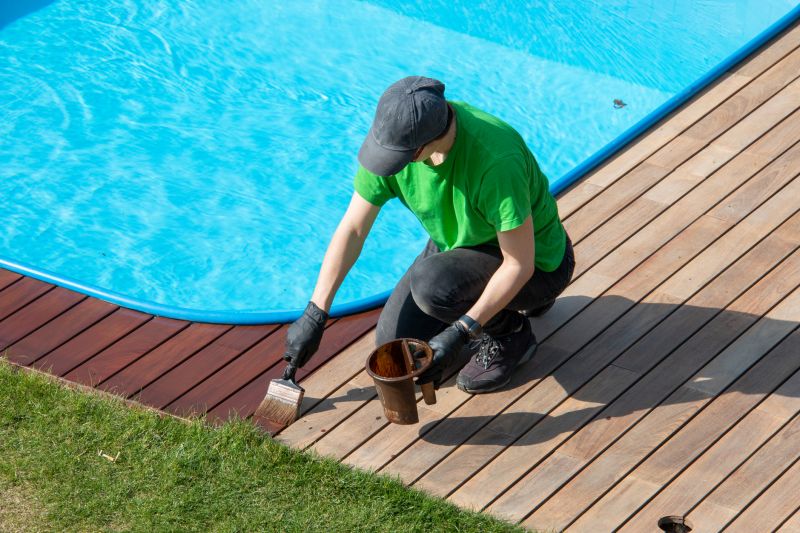 Local Pool Deck Painting Service pros at work